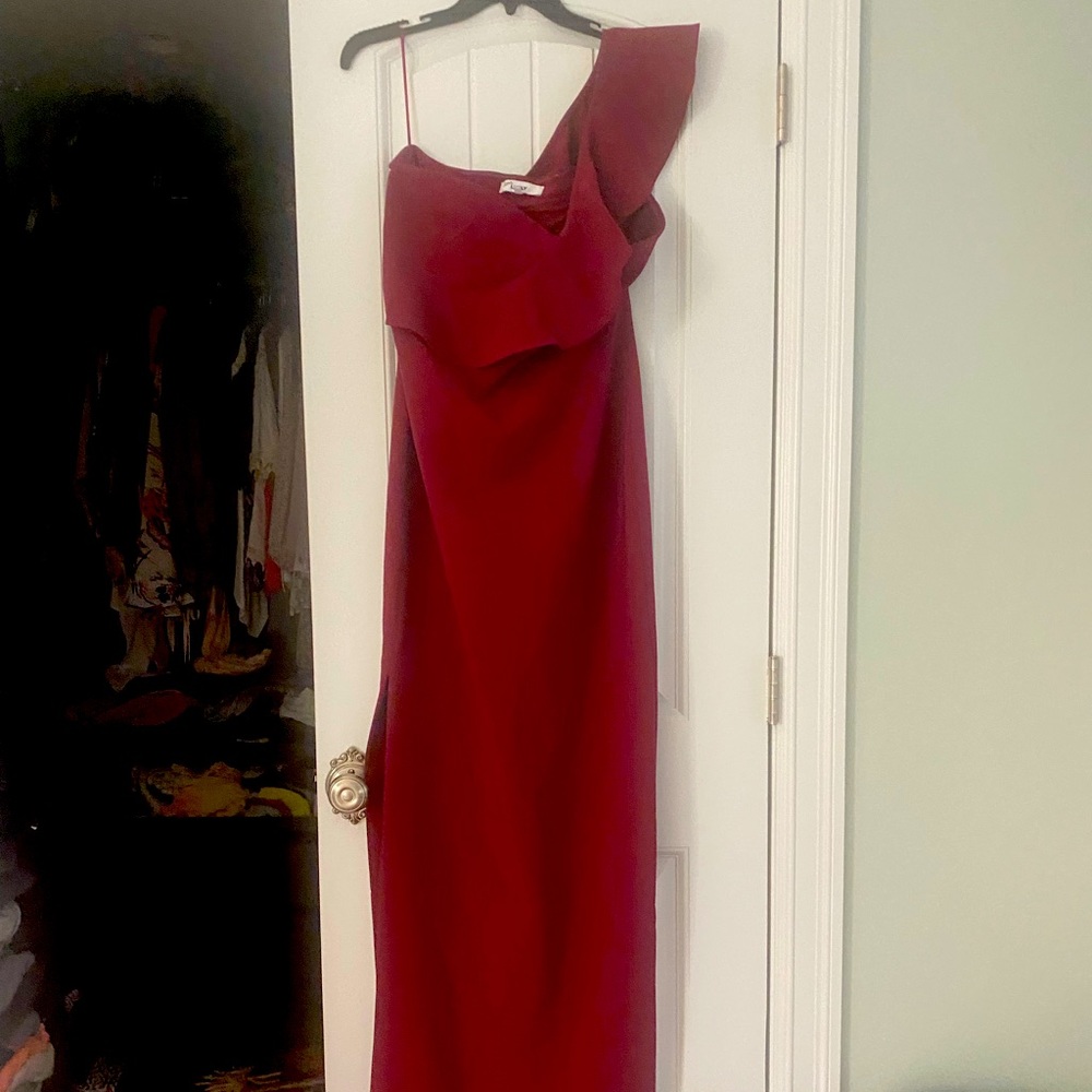 Likely maroon gown